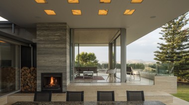 As a playful addition to this home, the architecture, ceiling, house, interior design, living room, lobby, patio, real estate, table, brown, black