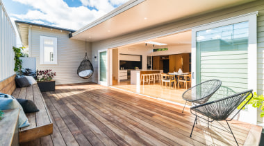 A large deck and outdoor bench virtually double deck, estate, floor, flooring, hardwood, home, house, interior design, laminate flooring, outdoor structure, property, real estate, siding, window, wood, wood flooring, white