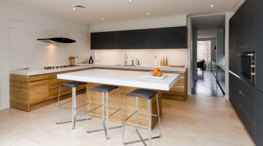 This kitchen doesnt have just one eye-catching feature countertop, floor, flooring, interior design, kitchen, real estate, room, gray