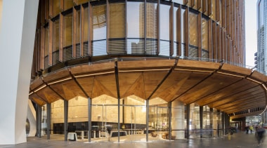 The broad folded timber awnings that shade and architecture, building, facade, structure, brown