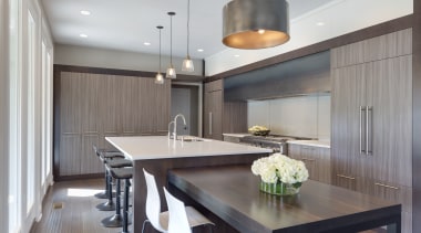 With cabinetry on two walls, a generous cooking ceiling, countertop, dining room, interior design, kitchen, real estate, gray
