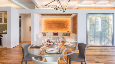 Dating back to the 1900s, this New York ceiling, dining room, hardwood, home, interior design, living room, real estate, room, table, wall, window, gray, orange