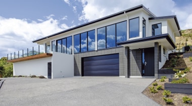 High-quality cladding, roofing and finishes protect this seaside architecture, building, elevation, estate, facade, home, house, property, real estate, residential area, window, gray