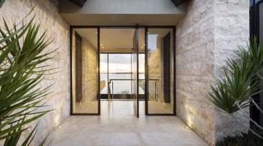 The pivot front door opens to present guests apartment, courtyard, door, estate, facade, home, house, property, real estate, window, gray