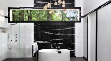 This pampering bathroom by TRG Architecture + Interior bathroom, floor, flooring, interior design, product design, shelf, tap, wall, gray, black