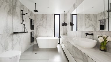 Large format, marble-look porcelain tiles contribute to the architecture, bathroom, floor, flooring, home, interior design, plumbing fixture, product design, room, tap, tile, gray