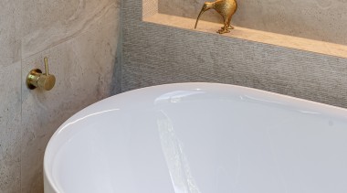 A textured tile and recess LED strip lighting 