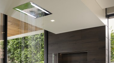 In the primary bathroom suite a Calcutta slab 