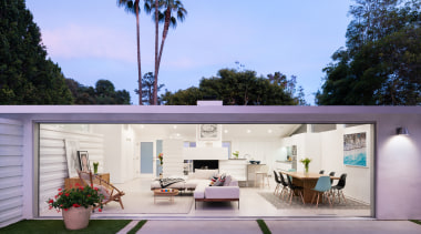 The living room opens up to the pool 