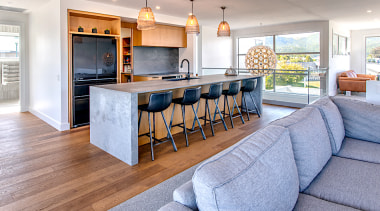 Reflecting the home's stunning central plateau landscape, this architecture, building, cabinetry, ceiling, countertop, dining room, estate, floor, flooring, furniture, hardwood, home, house, interior design, kitchen, living room, property, real estate, room, table, wood, wood flooring, gray, teal