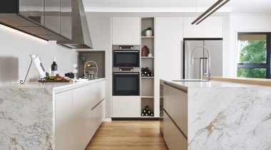 Relaxed kitchen celebrates traditional tones and minimalist cabinetry architecture, building, cabinetry, ceiling, countertop, cuisine classique, floor, flooring, furniture, hardwood, home, house, interior design, kitchen, material property, property, room, tile, wood flooring, gray, white