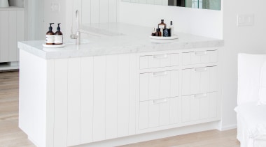 The vanity divides off the bedroom from a 