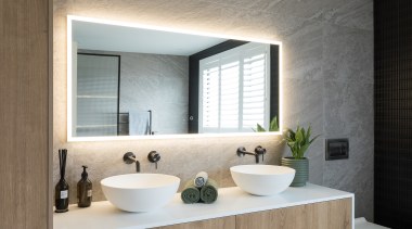 Feature dark finger tiles contrast the large format 