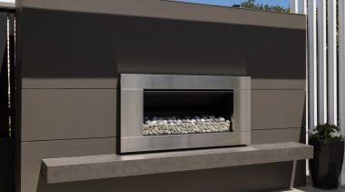 The sculptural outdoor fire surround was also created 