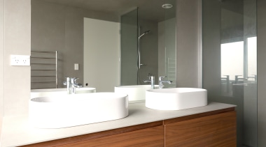 To prevent mould, crevices and grout lines were architecture, bathroom, bathroom accessory, bathroom cabinet, bathroom sink, bathtub, building, ceramic, floor, furniture, house, interior design, material property, plumbing fixture, property, room, sink, tap, tile, gray, white