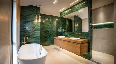 A bold palette sees a bespoke oak timber 