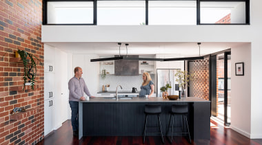 The low ceiling over the kitchen steps up 