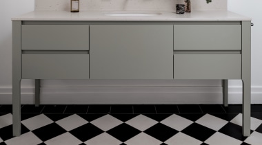 The wall mirror gives the playful illusion of 