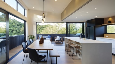 A living edge dining table is adjacent to 