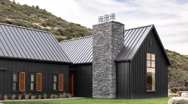 The substantial stone-clad chimney also forms a dramatic 