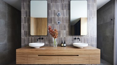 The restrained design introduces handmade tiles on wall 