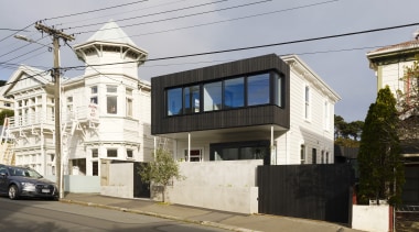 Street view of the expanded home. - Respectful 