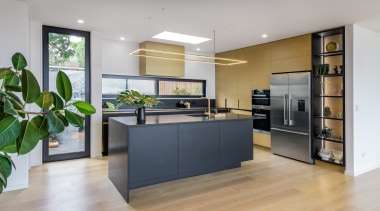 The kitchen is to the side of an 