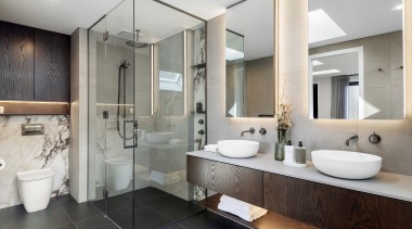 Extra storage space was added above the toilet 