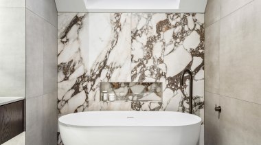 Freestanding bath with floor mounted tap creates drama 