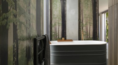 The iconic Patricia Urquiola Vieques tin bath is 