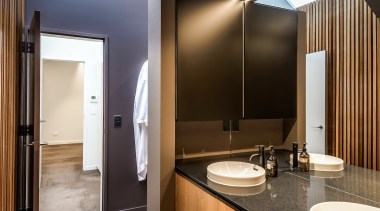 Large roof skylights flood the bathroom, dressing room 