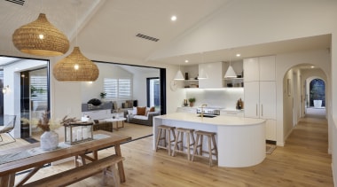 Rattan pendants add to the warm vibe. - 