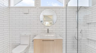 The vanity was relocated to be opposite the 