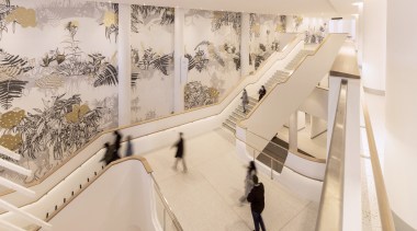 Large-scale illustrations by Erica Seccombe feature along Hospital 