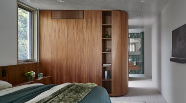 The ensuite bathroom is set at the end 