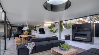 The pavilion roof is pierced with strategically placed 