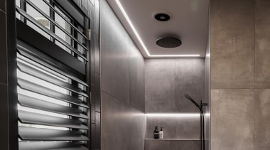 Black shutters match with the black strip tiles 