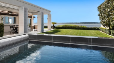 The pool's reclining occupants look to the water 