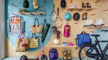 On the garden level, a custom pegboard hanging 
