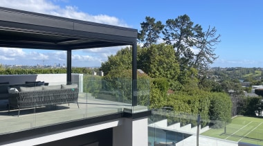 A new dark modern louvre structure frames the 