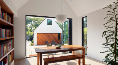 The open-plan dining area seamlessly blends between the 