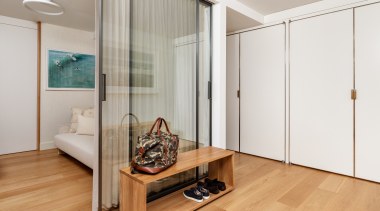 The use of sliding glass panels maintains the 