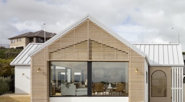 Giant picture windows take in the views while 