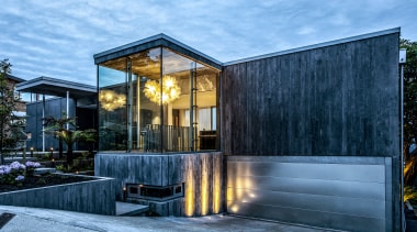 The industrial glass box staircase was warmed up 