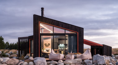 Stone boulders reclaimed from the site excavation created 