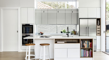 Clerestory windows help to flood the kitchen with 