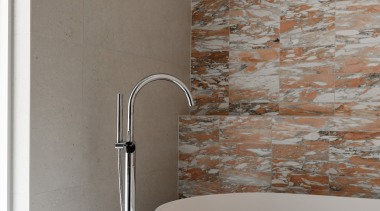 Norwegian Rose marble tiles provide a feature surface 
