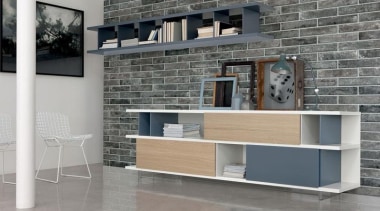 Brick One has the benefit of a considerably chest of drawers, desk, floor, furniture, interior design, shelf, shelving, table, wall, gray
