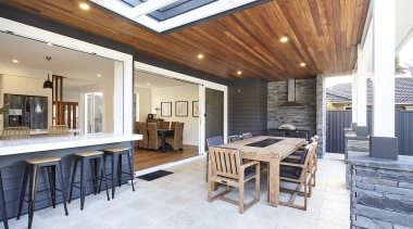 The covered outdoor rooms morphs into the open 