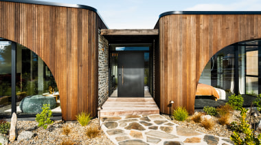 Inspired by a diving whale’s tail, the home 